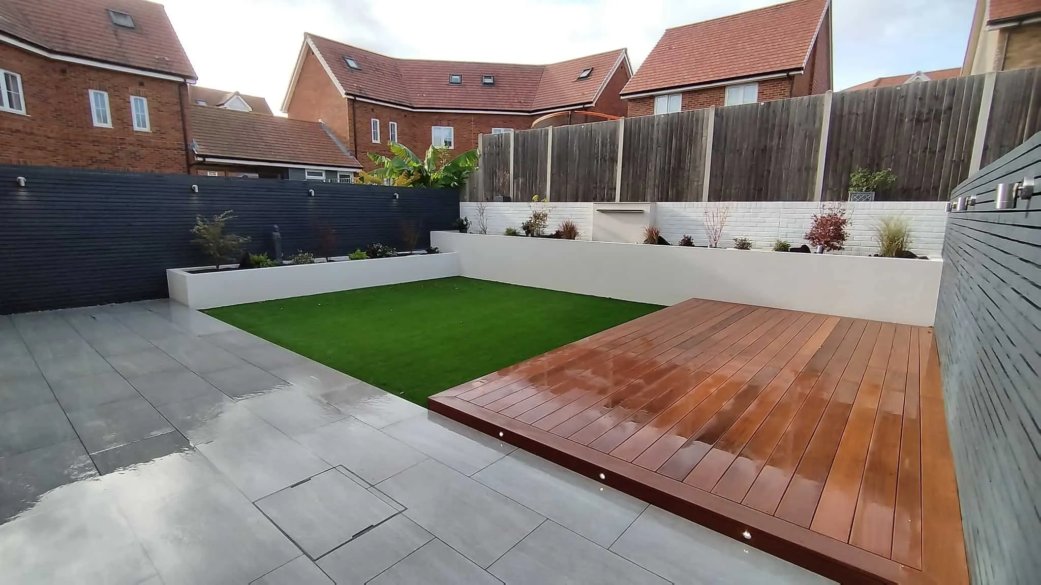Finished garden with decking and lawn, built by RF Construction in Hailsham