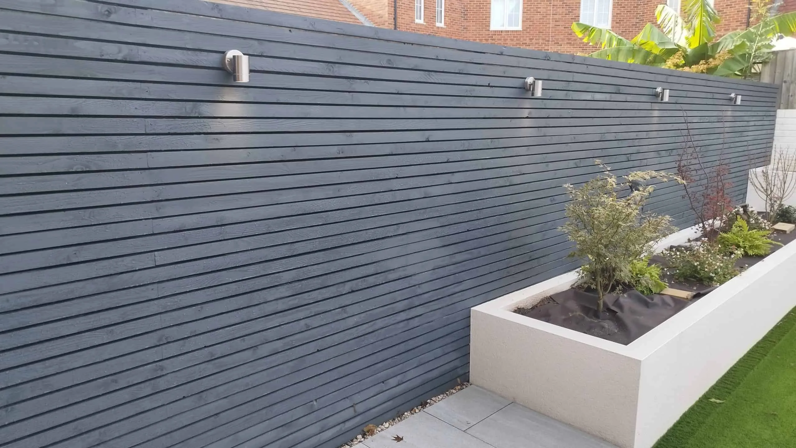 Contemporary timber slat fencing in a modern Hailsham garden
