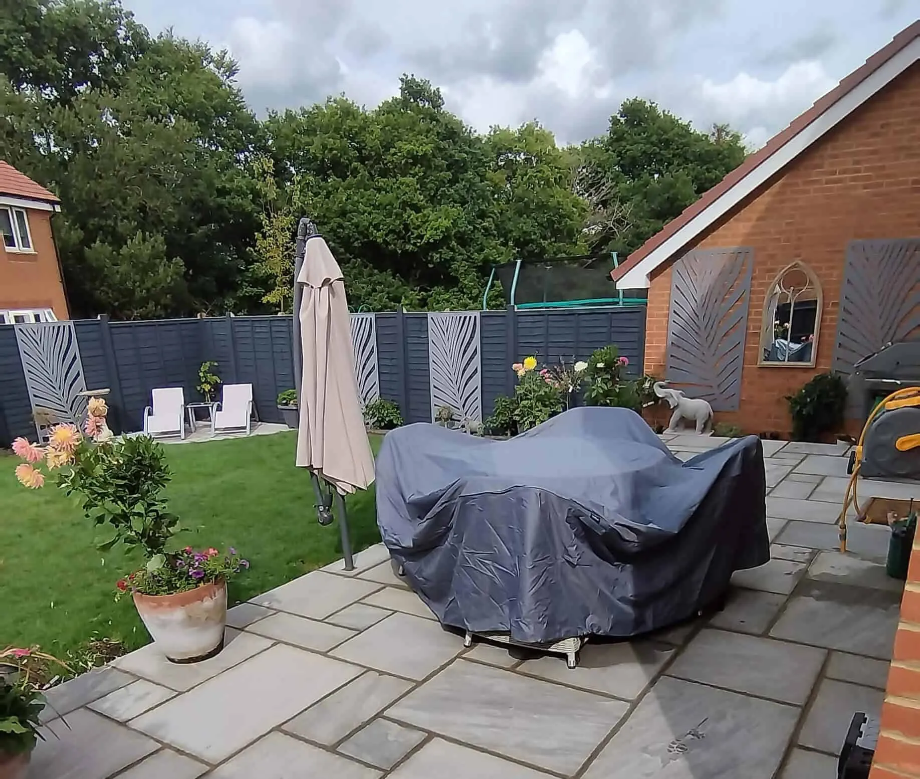 Kandla Grey Indian sandstone patio in a new-build garden in Hellingly